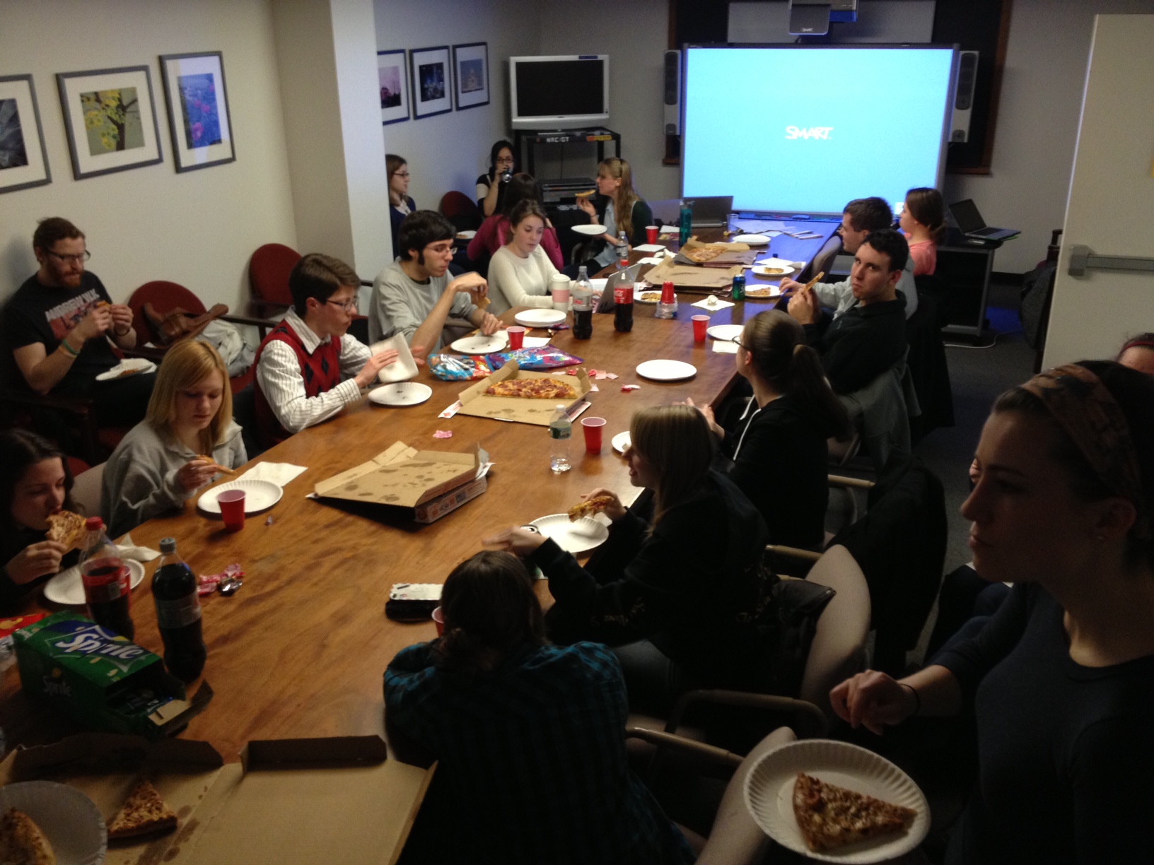 Each year, NSoE Junior and Senior Honors students gather for a pizza part to discuss thesis progress.